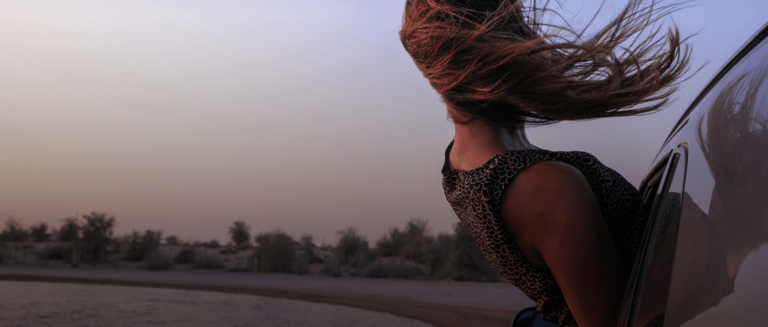 woman-with-long-hair-reading-a-book-outdoors-2022-11-14-21-13-30-utc 1